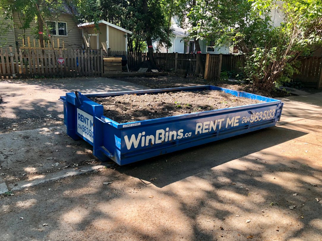 Winnipeg Bin & Dumpster Rentals by WinBins - 4 yard winbin loaded nicely with mud