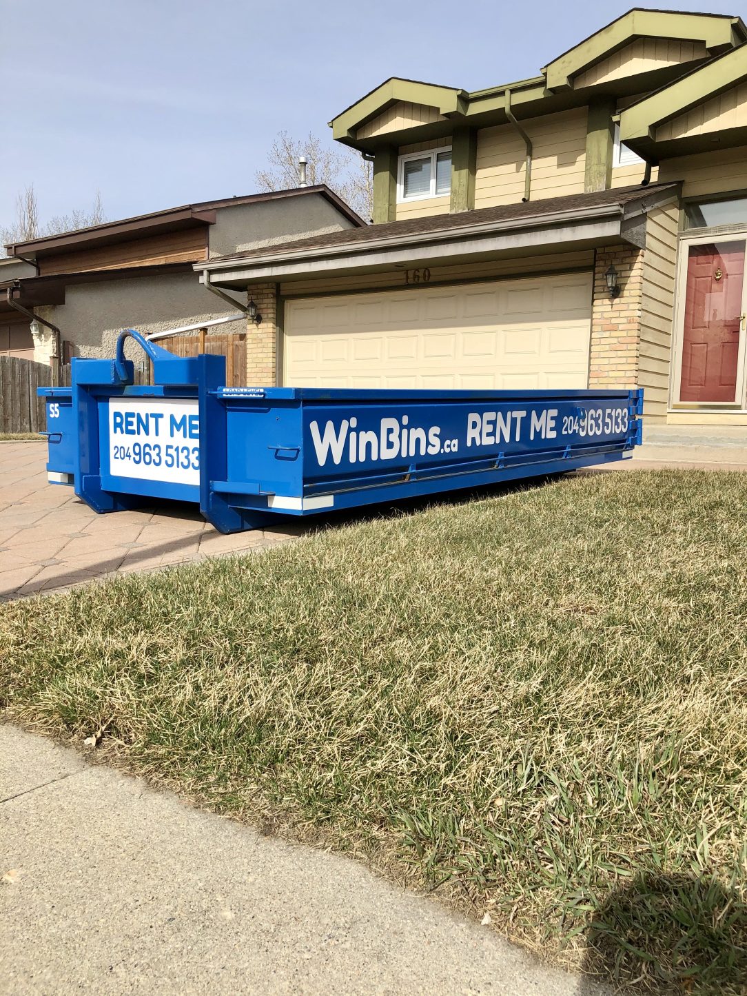 Winnipeg Bin & Dumpster Rentals by WinBins - 4 Yard in Brick Driveway 1